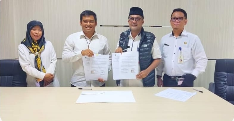 Kepala Dinas KUKM Perindag Kabupaten PPU Margono Hadi Sutanto (Kiri). (Ist)