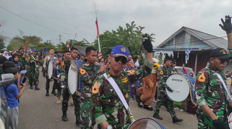 Drumband Taruna Latsitardanus XLIV Meriahkan HUT Ke-12 Desa Senaken. (Ist)